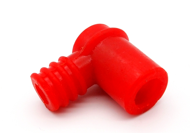 Spark plug cap red elastic.